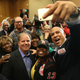Democratic senatorial candidate Doug Jones (front, second from left) takes a group picture with Sen. Cory Booker (right) and Rep. Terri Sewell (third from right) and supporters during a campaign event at Alabama State University at the John Garrick Hardy University Student Center on Dec. 9, 2017, in Montgomery, Ala. (Joe Raedle/Getty Images)